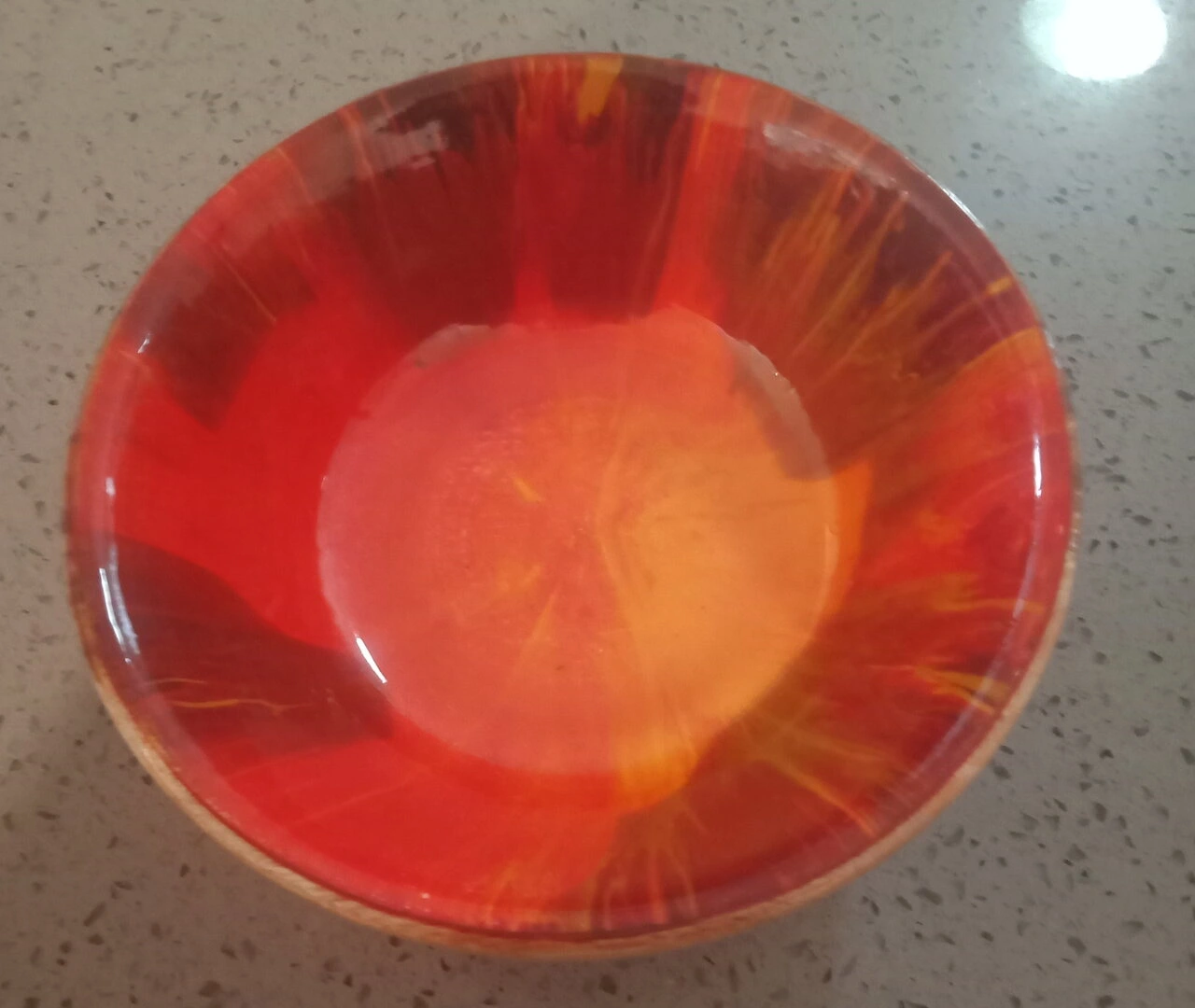 Red and orange wood bowl